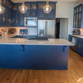 Kitchen remodel — navy cabinetry & hardwood