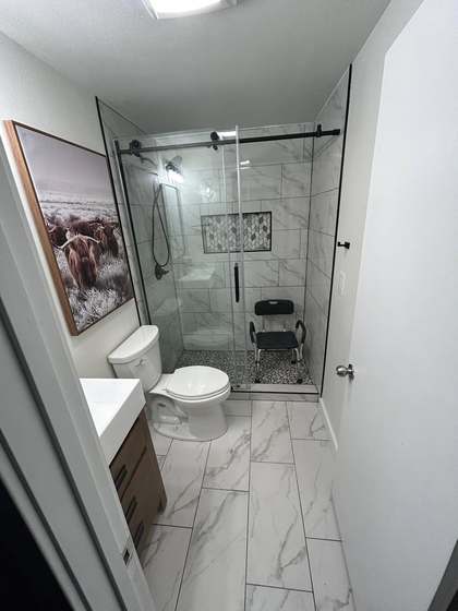 Walk-in tile shower — marble porcelain
